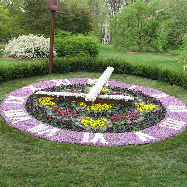 Enhance Your Landscape with a Beautiful Flower Garden Clock