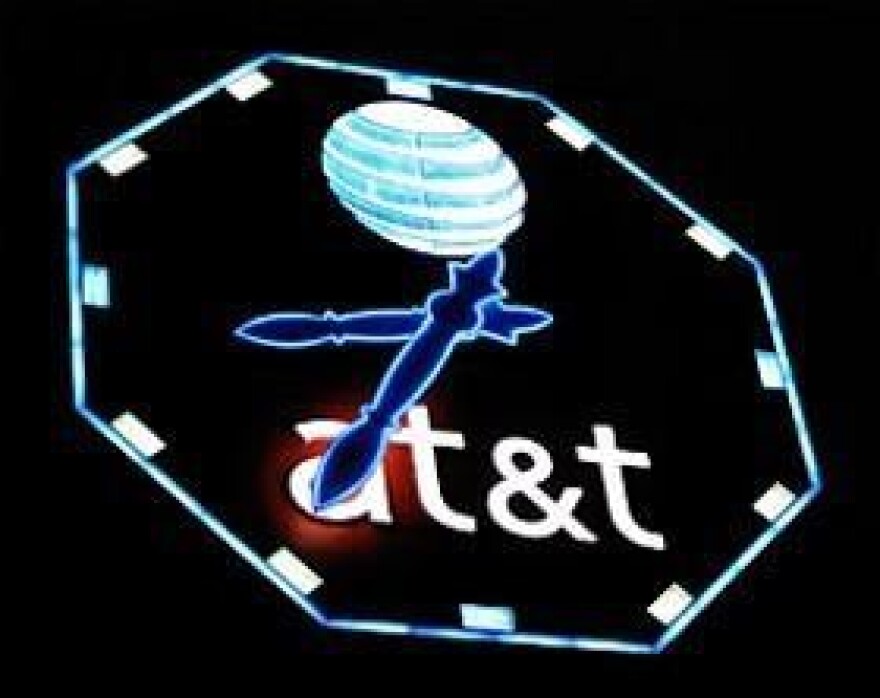 A massive, illuminated clock with the AT&T logo on it.